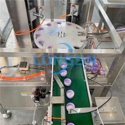 Automatic Sauce Bottle Cap Closing and Liner Wad Inserting Machine