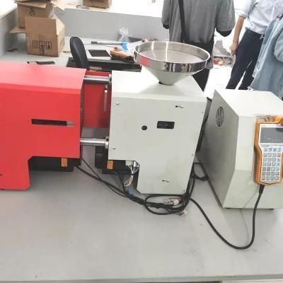 Small Top 10 Ton Benchtop Hydraulic Acrylic Electric Plastic Injection Molding Machine for ...