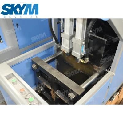 Semi Automatic 2 Cav Pet Bottle Blow Molding Machine to Make Different Kind of Beverage ...